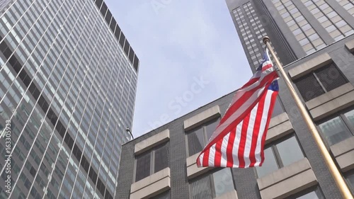American flag against bright blue sky