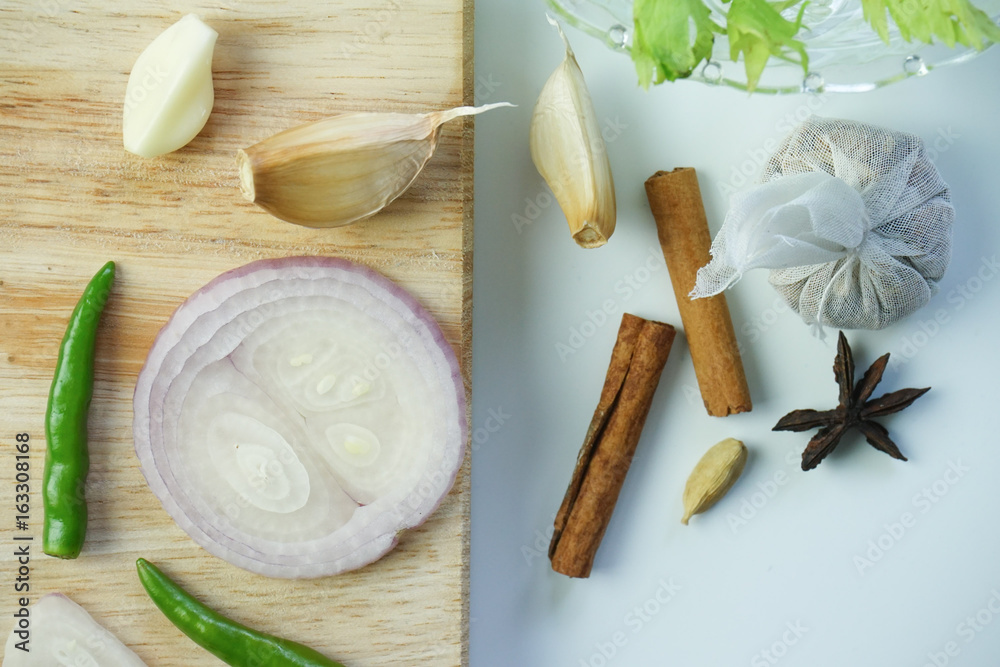 Spice and chopping board on white background. Spice and chopping board on white background.