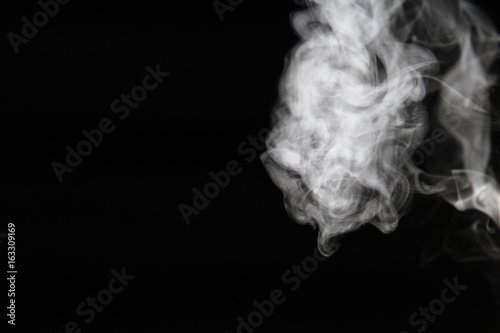 Smoke background / Smoke is a collection of airborne solid and liquid particulates and gases emitted when a material undergoes combustion