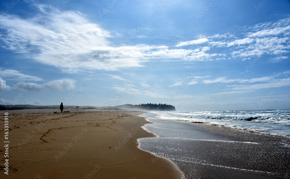 Wave and sand beach for background. Beautiful beach surface texture. Sea wave on sand beach digital illustration. Oceanic water tide on seashore. Belmont beach, Australia.