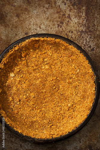 Tableau sur toile Pie base pastry made from crushed biscuits, butter and water - in tart pan