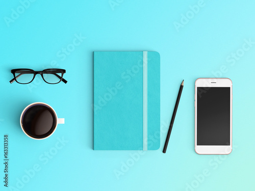 Modern office desk workplace with notebook diary, coffee cup, pencil and smartphone copy space on color background. Top view. Flat lay style. photo