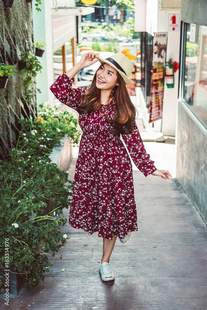 beautiful young asian girl have a happy time alone , vintage tone beautiful young asian girl have a happy time alone , vintage tone