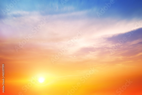 The blur pastels gradient sunset background on soft nature sunrise peaceful morning beach outdoor. heavenly mind view at a resort deck touching sunshine, sky summer clouds. © apichart