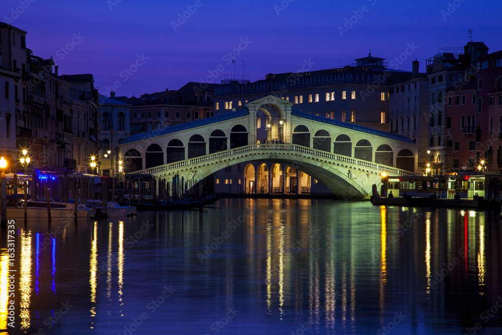 Venice's iconic Rialto Bridge at twilight