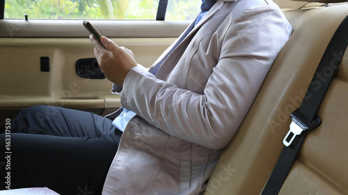 Business man in a car.