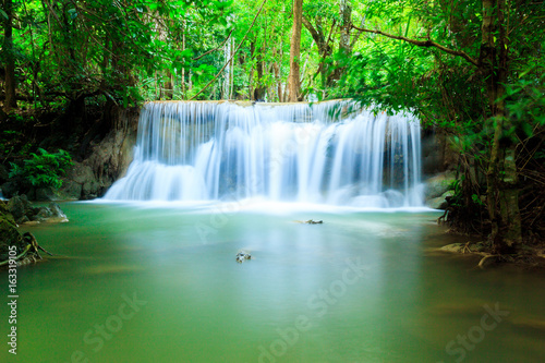 Deep forest waterfall at Huay Mae Kamin waterfall National Park Kanjanaburi Thailand