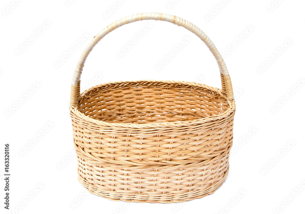 Rattan basket with handle isolated on white background
