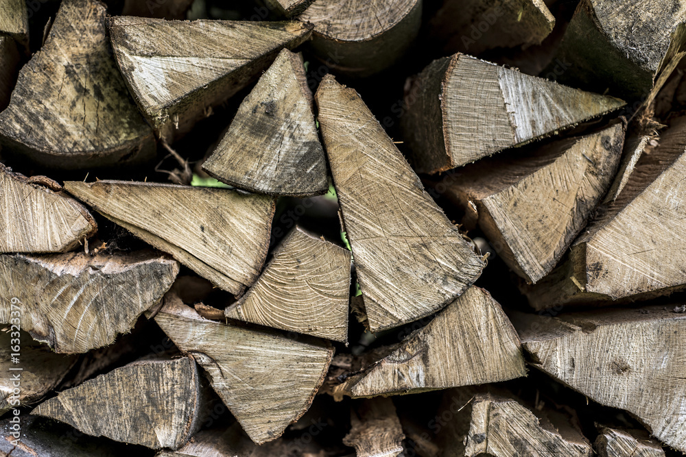 Abstract photo pile natural wood background dry chopped firewood logs ready for winter Abstract photo pile natural wood background dry chopped firewood logs ready for winter