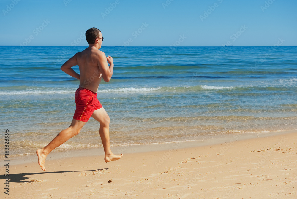 man running along the coast man running along the coast