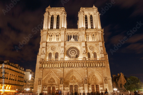 view on front side of Notre-Dame de Paris Cathedral at night