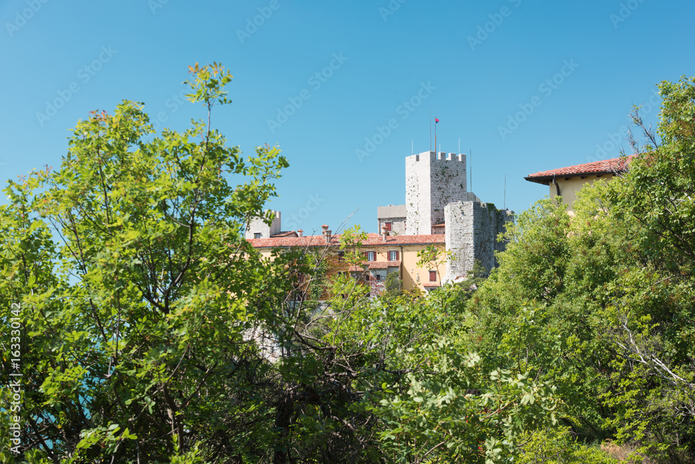 The castle of Duino and the beauty of the cliffs on the rocky coast