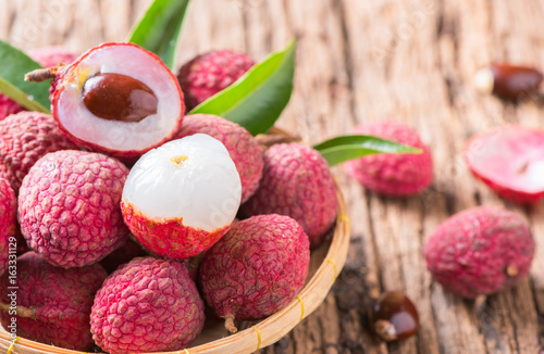 fresh organic lychee fruit on bamboo basket