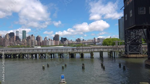 Viewing beautiful breathtaking Manhattan Skyline from Long Island City in New York, wide shot panorama with ONU,United Nations Headquarters,Ultra Hd 4k, real time