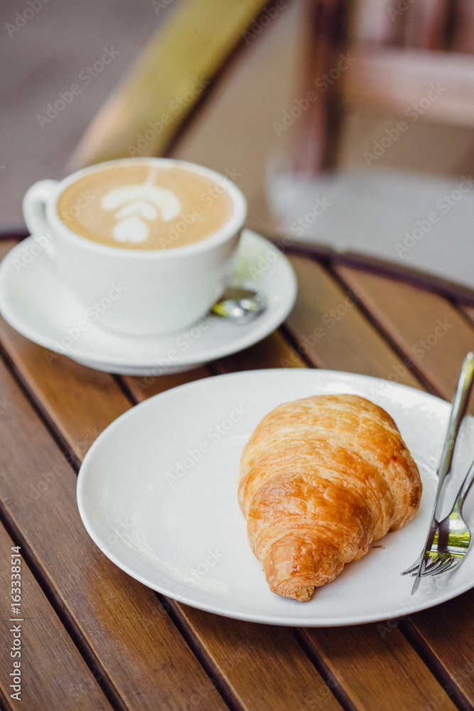 Coffee with croissant 