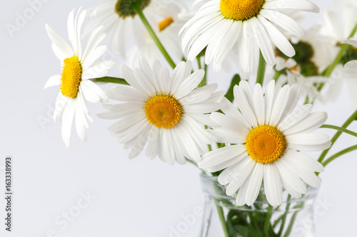 bouquet of field daisies in a vintage