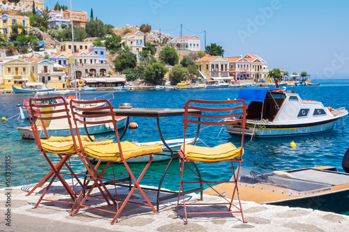 Fototapeta Naklejka Na Ścianę i Meble -  Cafe on Symi Island. Greece