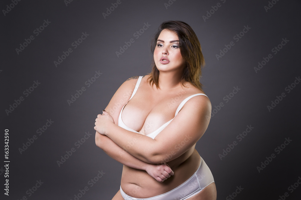 Plus size fashion model in underwear, young fat woman on gray background,  overweight female body Stock Photo | Adobe Stock