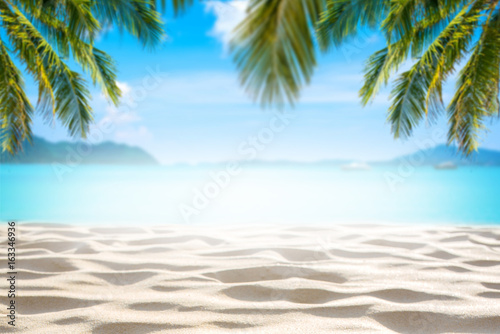 Tropical beach with sea-star in sand, copyspace for text. Concept of summer relaxation