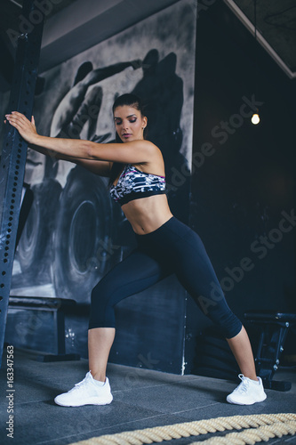 Beautiful athletic woman - fitness workout in gym.  © hedgehog94