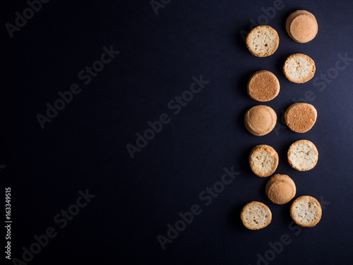 Kammerjunker - small Danish crisp biscuits usually eaten with cold buttermilk soup for dessert - isolated on black background