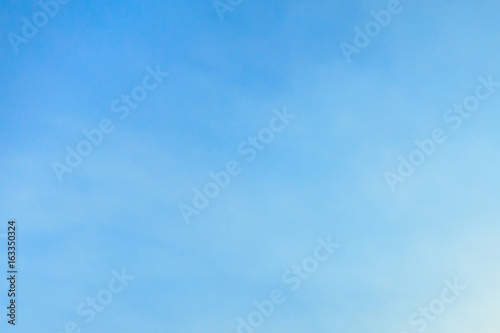 Clear Blue sky and clouds background.