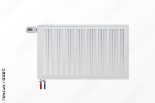 Steel panel Radiator on wall. The thermostatic control valve.