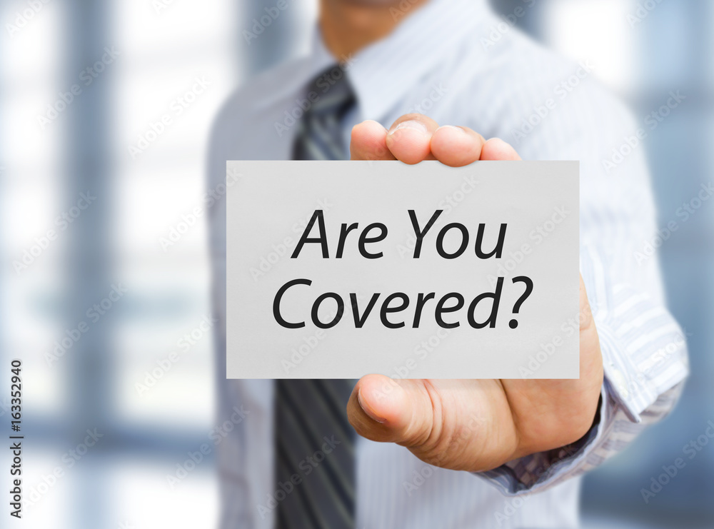 business man holding paper board with insurance concept business man holding paper board with insurance concept