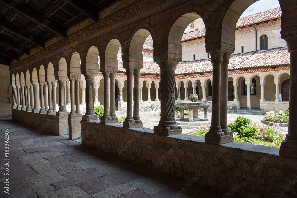 Abbey of Follina. Cloister and works of art.
