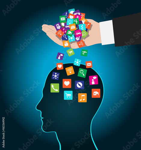 Hand loads icons head. Mobile apps installed into the brain, replacing the mind