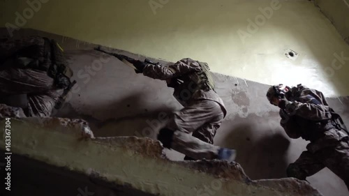 Team breaking into a building