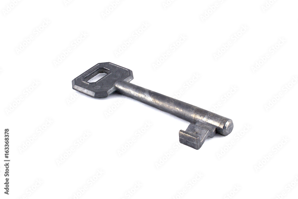 Grey common key for inside doors isolated on white. Grey common key for inside doors isolated on white.