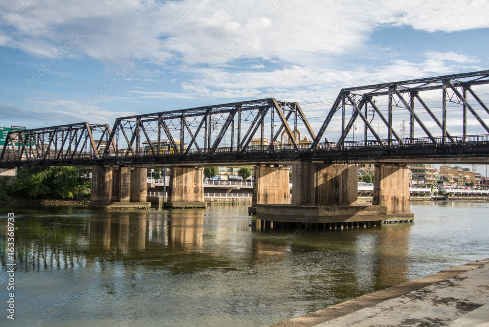 Beautiful clouds in the sky at Mae Klong river and railway bridge Ratchaburi province Thailand