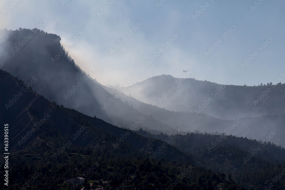 Smoke blowing off Perin's peak during Lightner Creek forest fire in Durango, Colorado