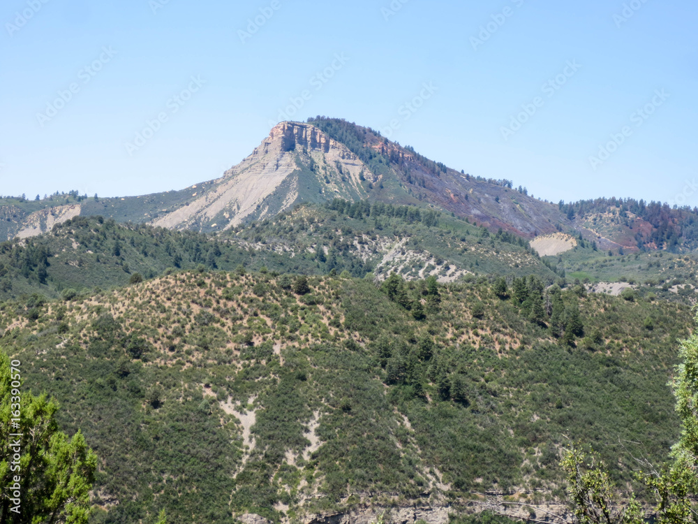 Perin's peak with a red streak of fire retardant slurry in Durango, Colorado Perin's peak with a red streak of fire retardant slurry in Durango, Colorado
