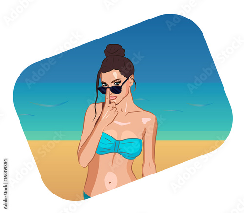 Hot sexy tanned girl in sunglasses on a beach, portrait