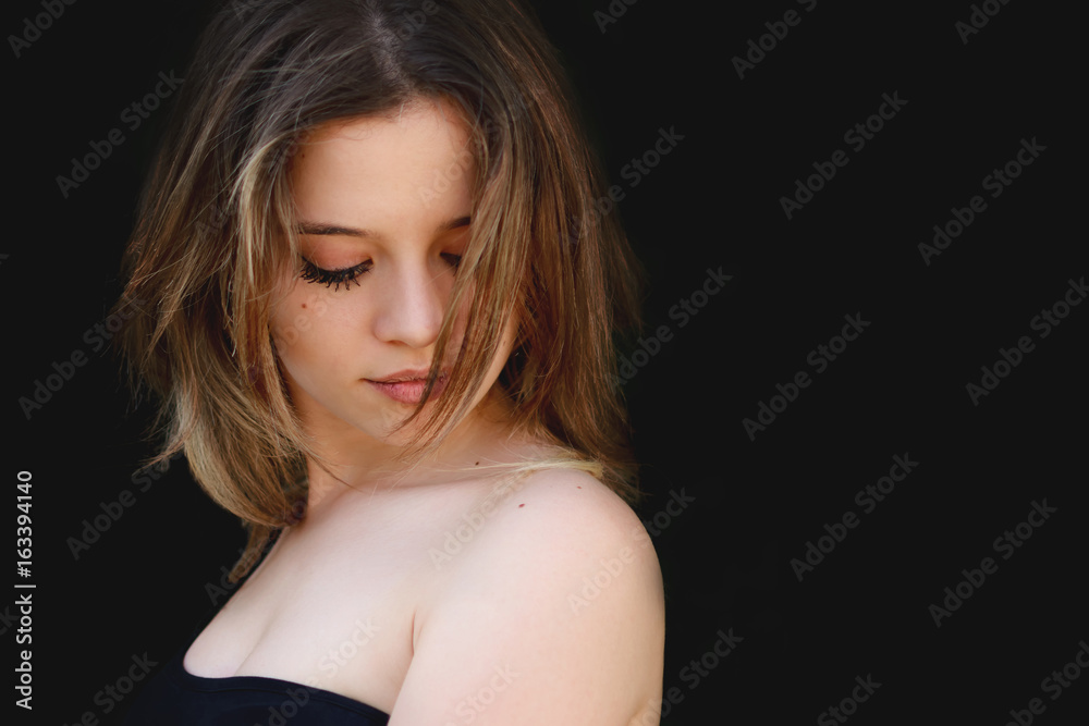 Portrait of a beautiful girl with the lowered look Portrait of a beautiful girl with the lowered look