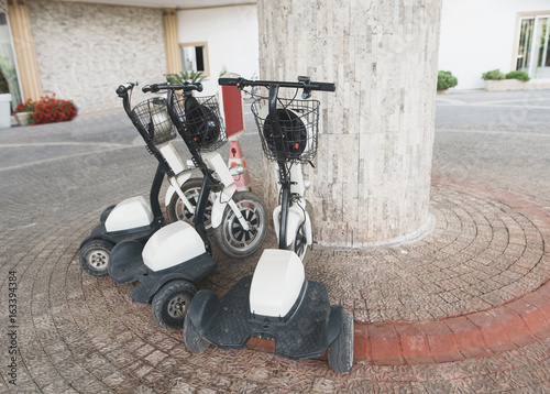 Three-wheeled electric scooters rental photo