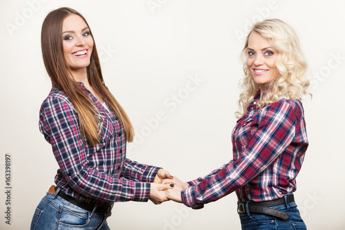 Portrait adult daughter with mother.