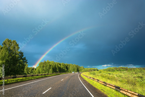 Colorful rainbow over the highway. © Valery Smirnov
