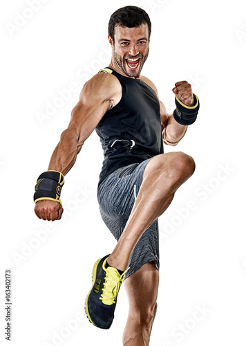 Fototapeta one caucasian fitness man exercising cardio boxing exercises in studio  isolated on white background
