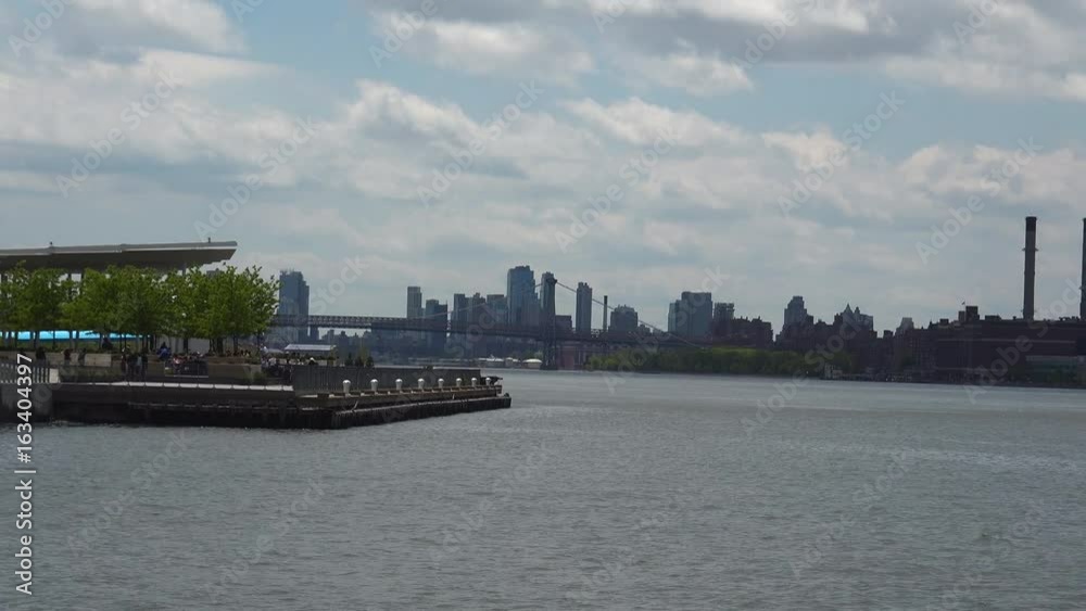 Viewing beautiful breathtaking Manhattan Skyline from Long Island City in New York, wide shot panorama with ONU,United Nations Headquarters,Ultra Hd 4k, real time Viewing beautiful breathtaking Manhattan Skyline from Long Island City in New York, wide shot panorama with ONU,United Nations Headquarters,Ultra Hd 4k, real time