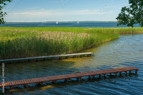 Sniardwy Lake with boardwalks in foreground photo