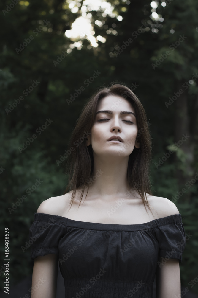 Sensual woman with closed eyes in nature Sensual woman with closed eyes in nature