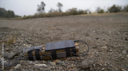 IMPROVISED EXPLOSIVE DEVICE (IED) ROADSIDE.  Slow dolly move. photo