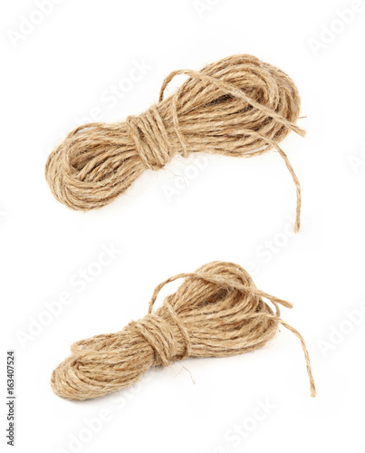 Fotografie Burlap jute twine coil skeins isolated on white