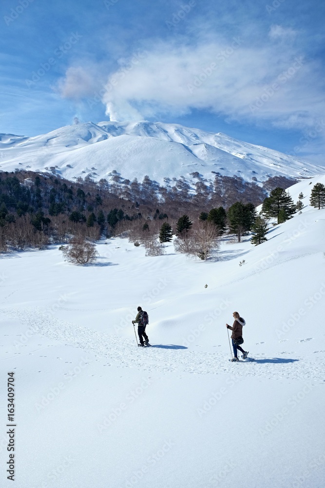 Snowshoeing In Winter Etna Park, Sicily Snowshoeing In Winter Etna Park, Sicily