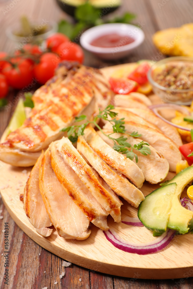 chicken breast sliced with vegetable and sauce chicken breast sliced with vegetable and sauce