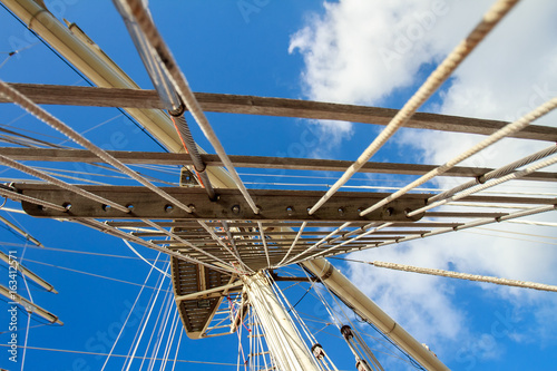 Fototapeta Naklejka Na Ścianę i Meble -  masts of sail vessel on sky background