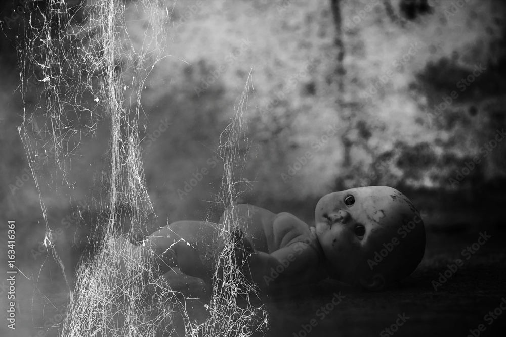 Fotografie Spooky doll in haunted house